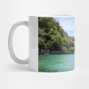 Pier over crystal clear water Mug